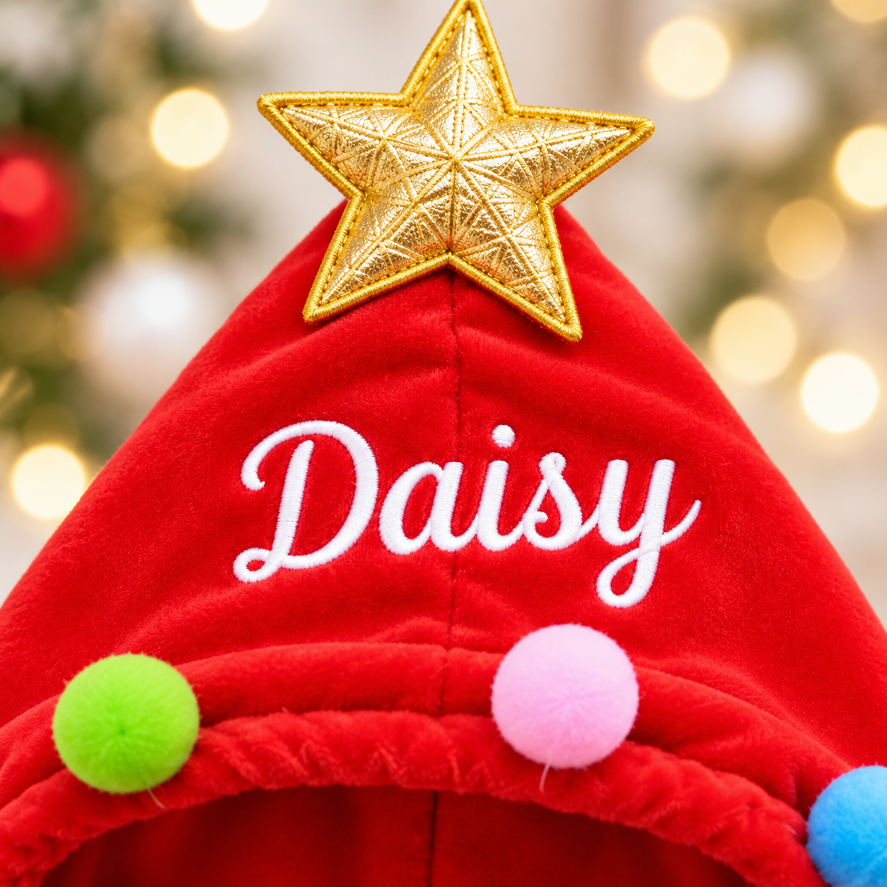 Close-up of the personalized pet name on the cape hood